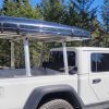 Hard shell roof top tent on a truck
