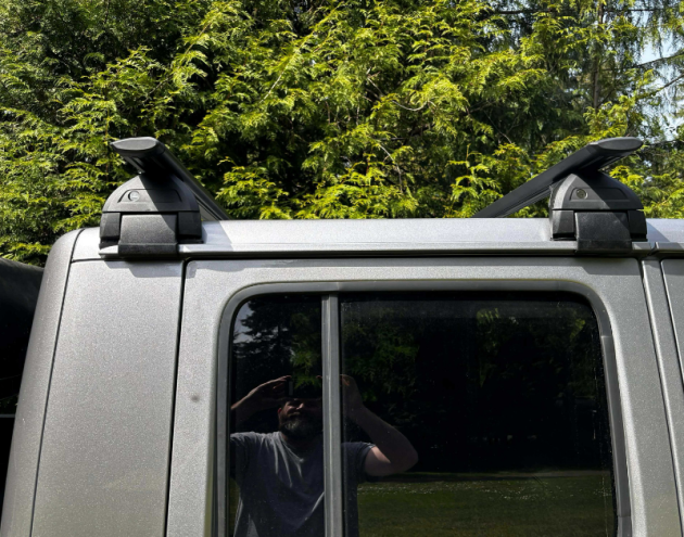 Jeep Gladiator rack crossbars with cargo mounted