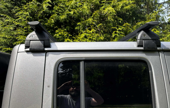 Jeep Gladiator rack crossbars with cargo mounted