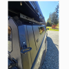 Toyota Tacoma 2016–2023 truck canopy mounted on bed with sleek black finish, ideal for secure storage and overlanding adventures