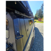 Toyota Tacoma 2016–2023 truck canopy mounted on bed with sleek black finish, ideal for secure storage and overlanding adventures