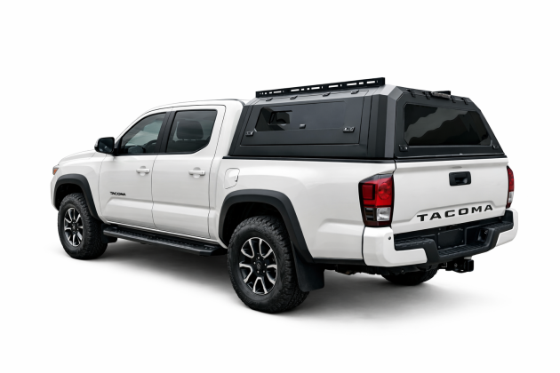 Toyota Tacoma with black overland canopy